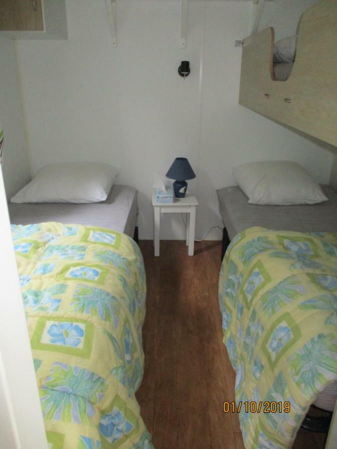 Les Mobile Home De Kerroyal Garlan Bagian luar foto